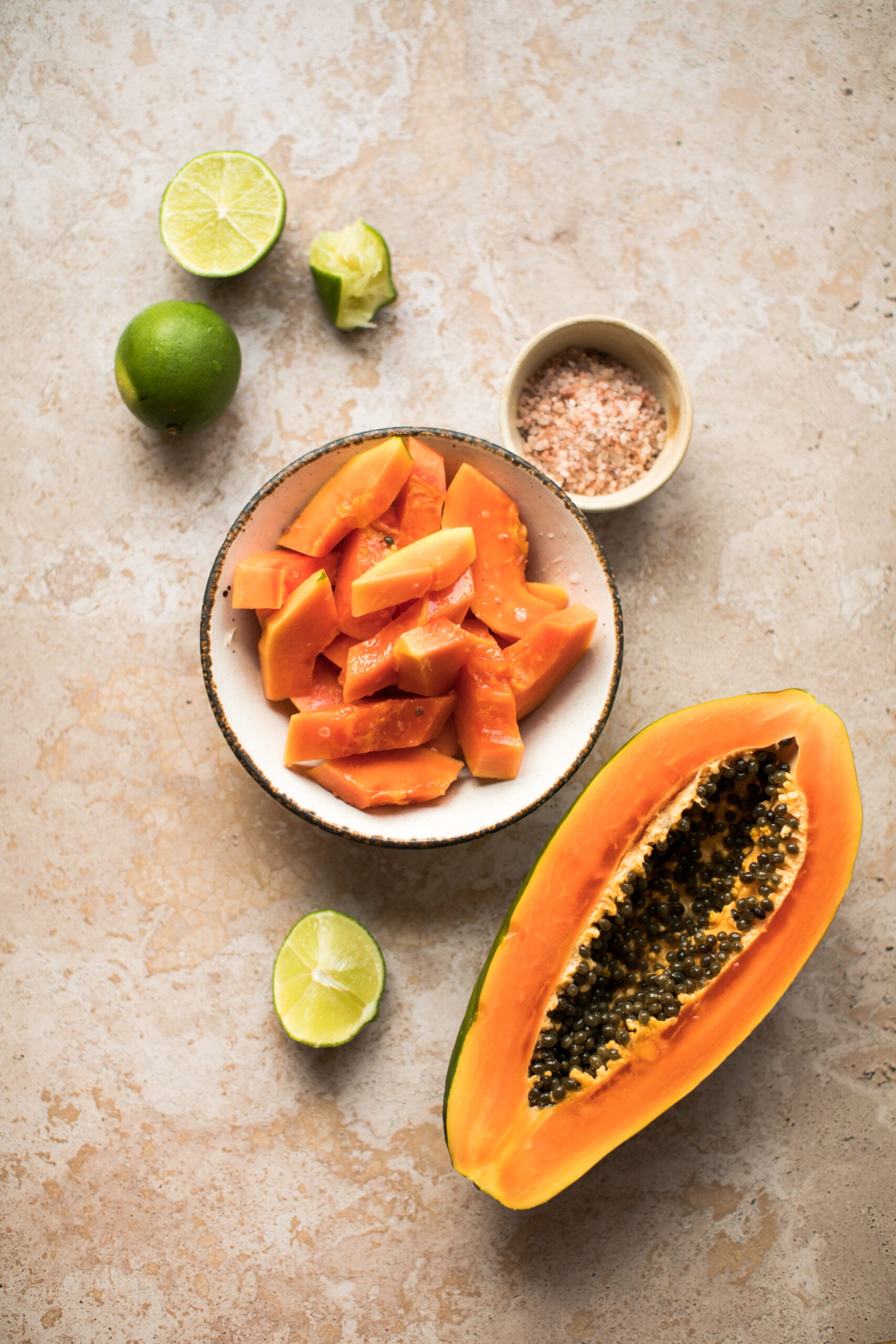 papaya pieces with lime and salt on plate cooking 2023 11 27 05 07 00 utc scaled